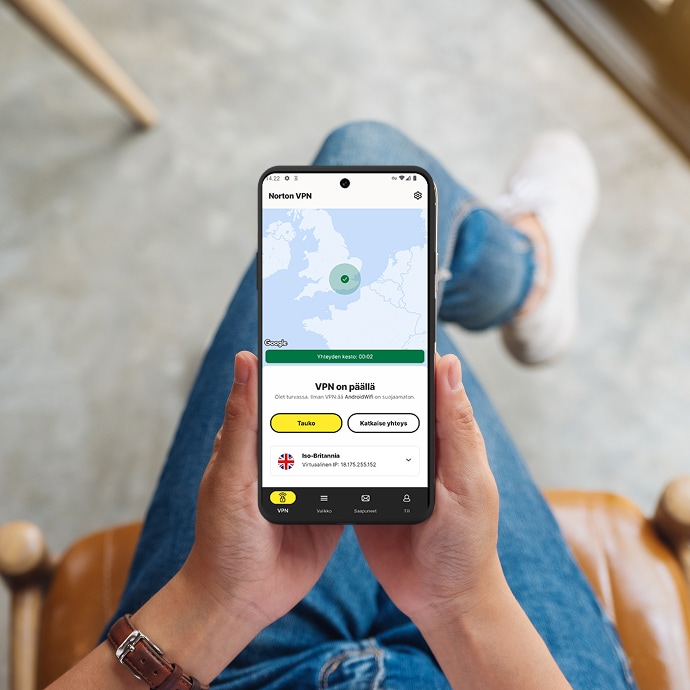 Puhelin, jonka näytöllä näkyy ”VPN päällä”